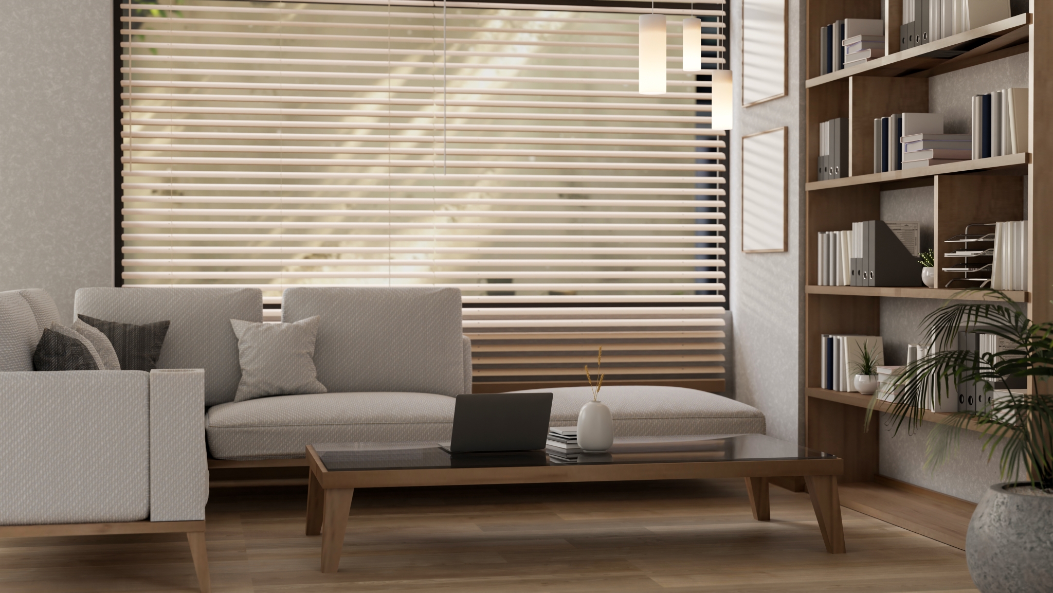 A cozy, contemporary minimalist living room features a large sofa and a laptop on a coffee table.