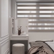 White folding window opening on mid century minimalist bedroom